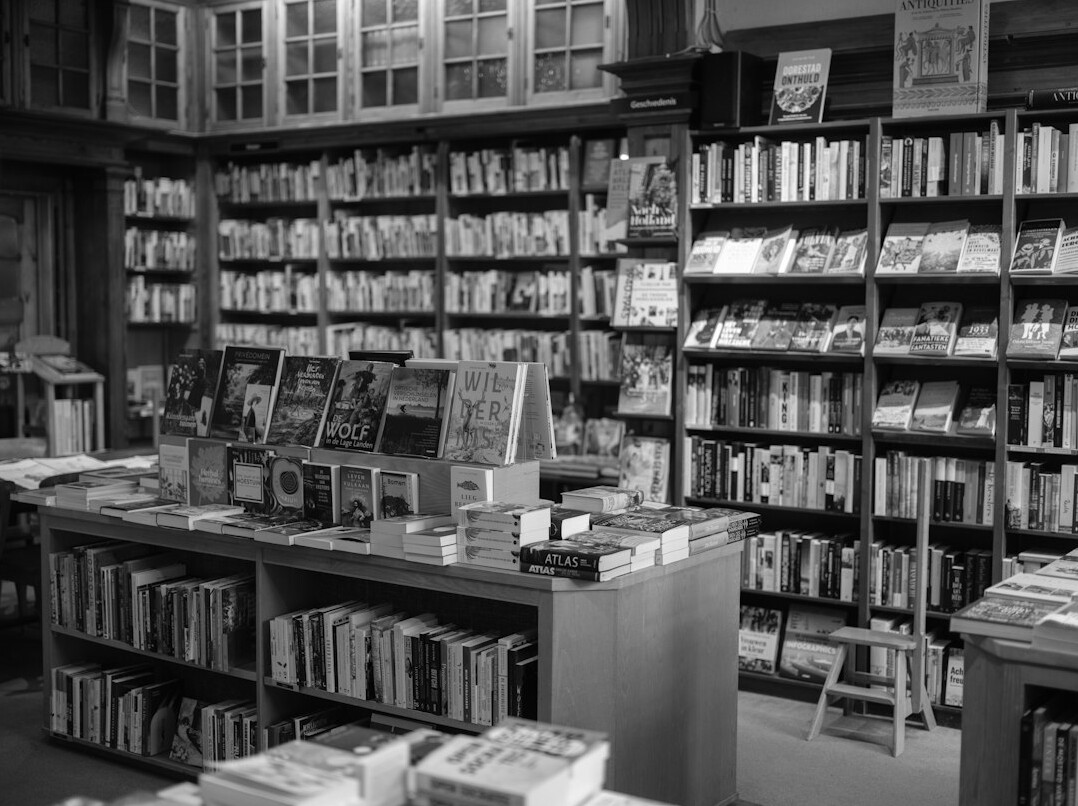 Rows of books on library shelves