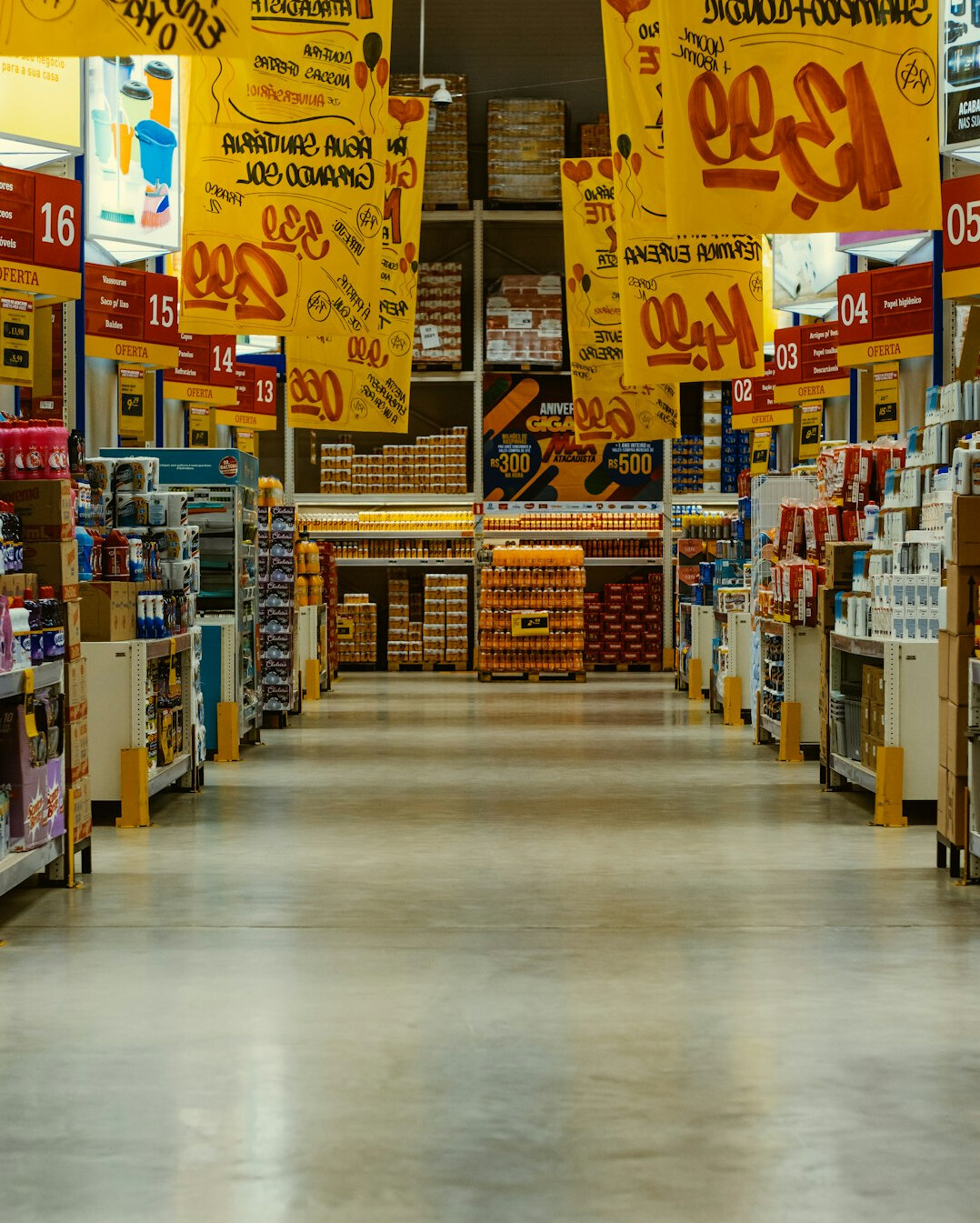 supermarket aisle with shoppers